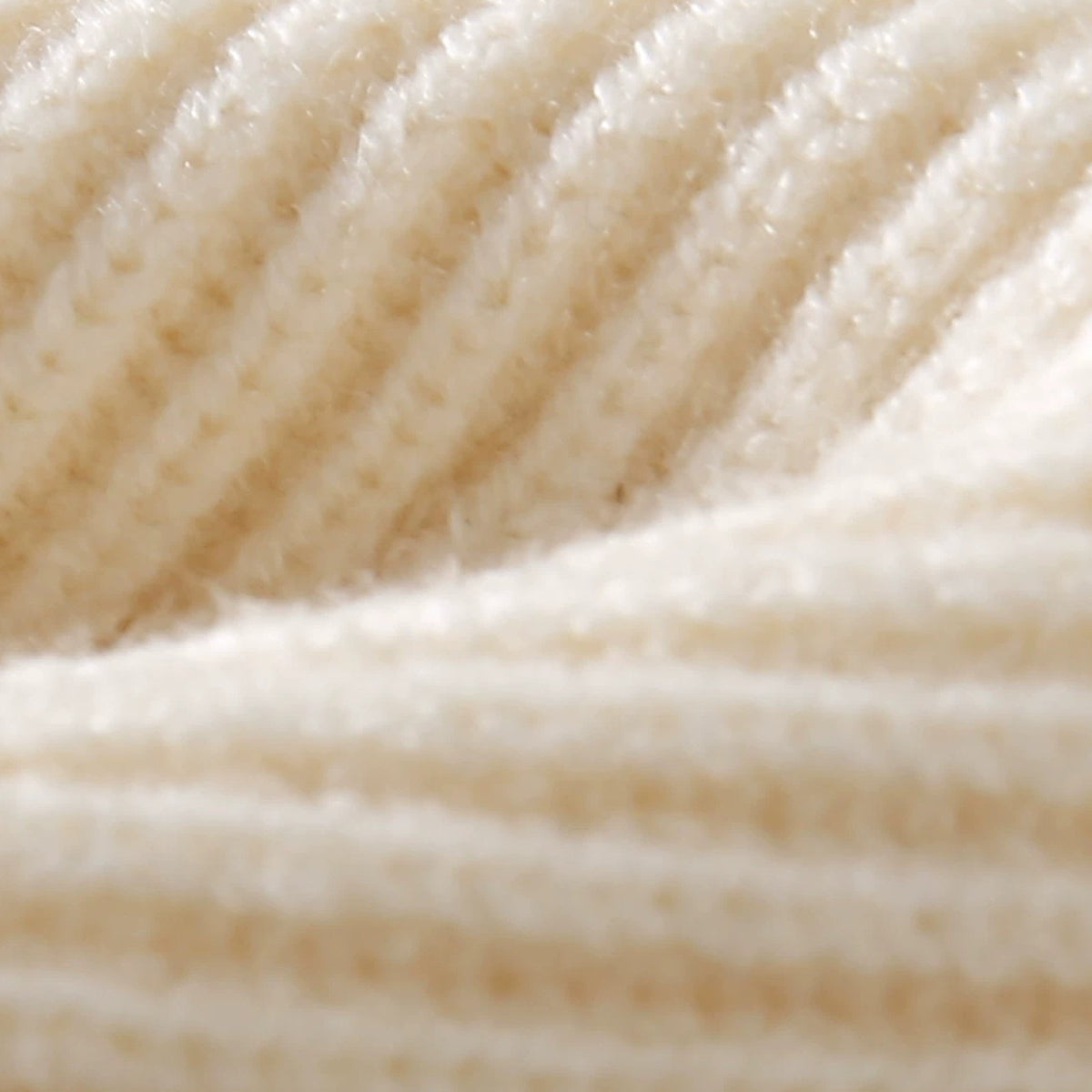 Close-up of the soft cream rib knit
