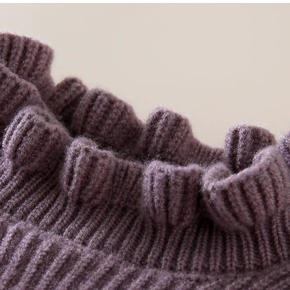 Close-up of the lilac frilled high neck