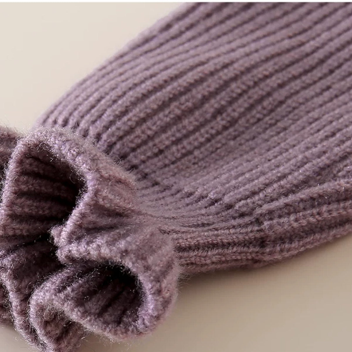 Close-up of the lilac ruffled cuff