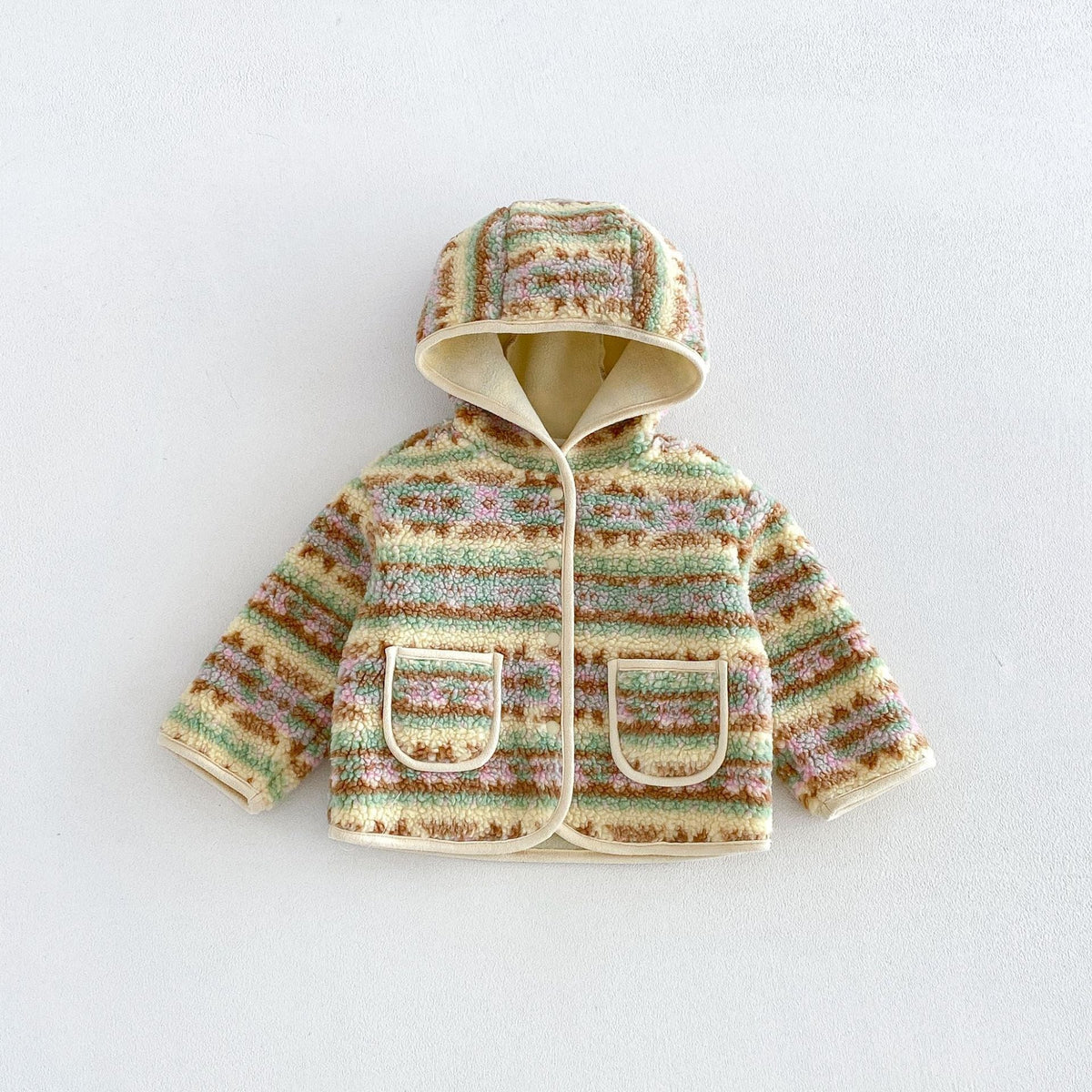 Butter-yellow striped hooded sherpa jacket, flat lay