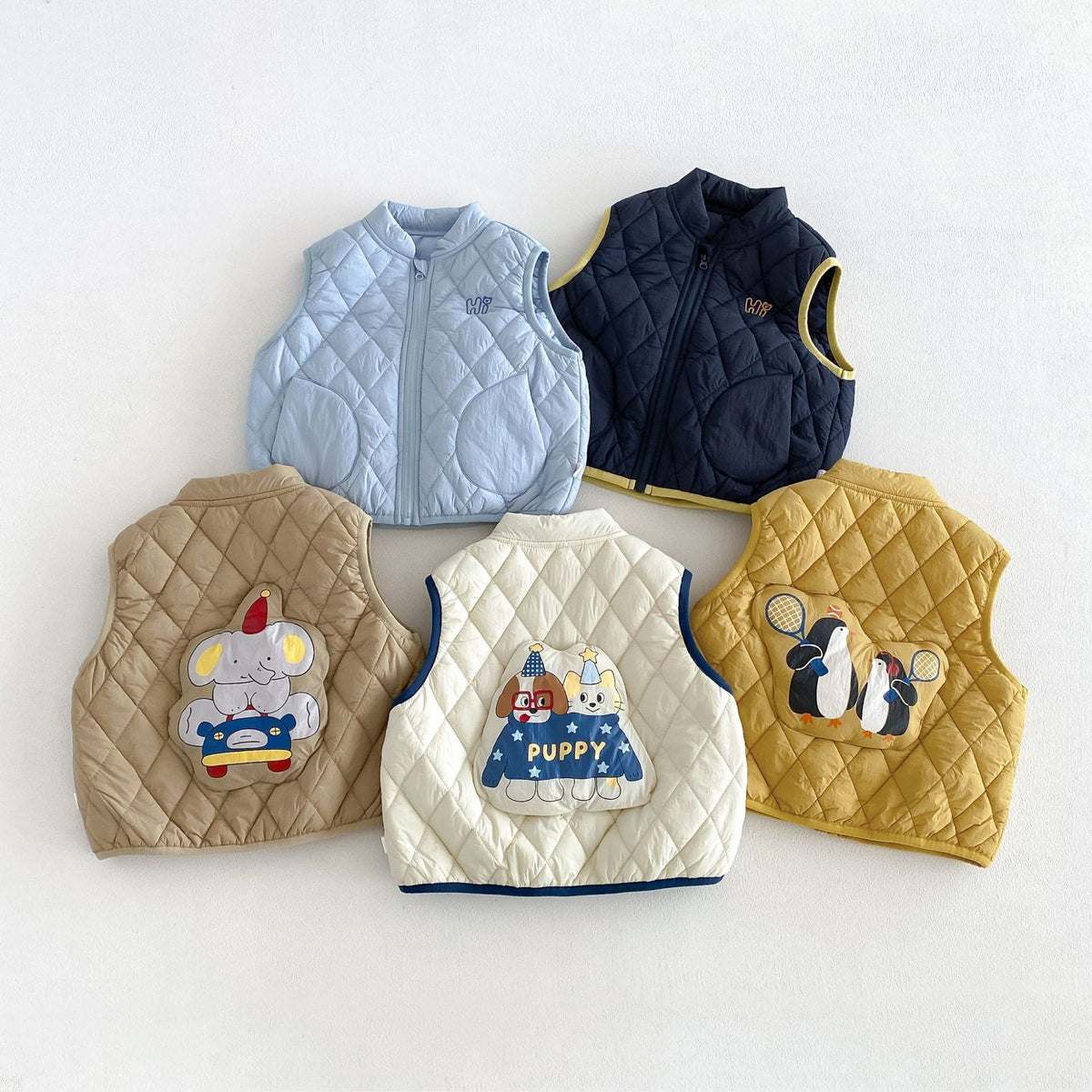 Five quilted puffer vests for kids with cute animal patches