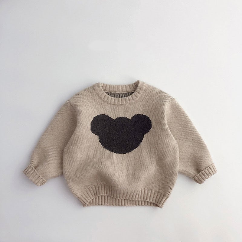Oatmeal kids knit sweater with a charcoal teddy bear silhouette, flat lay