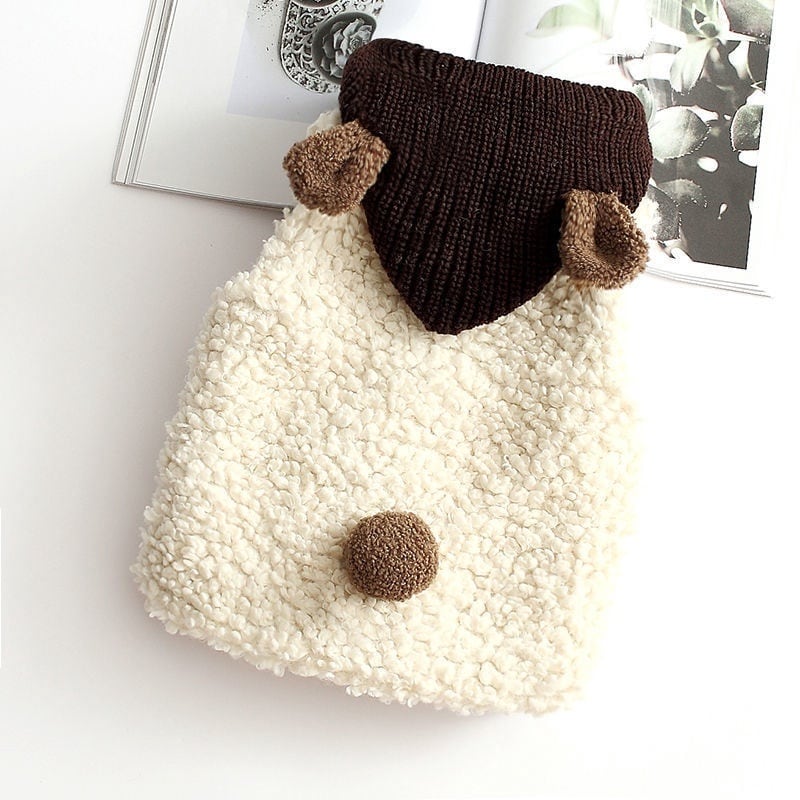 Cream sherpa baby vest with a dark brown knit hood and bear ears