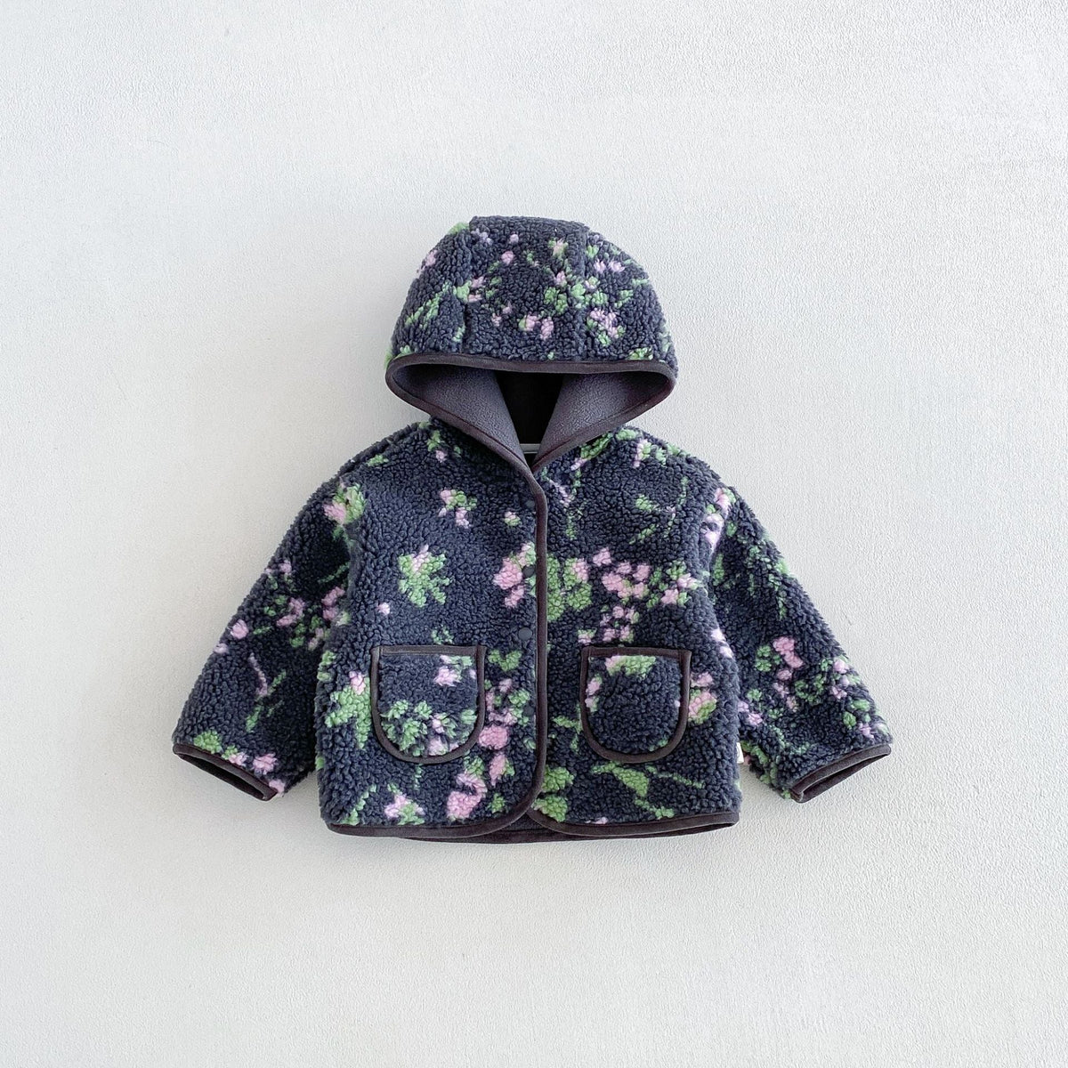 Slate grey floral hooded sherpa jacket, flat lay