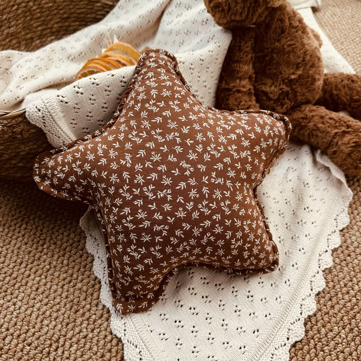 Cocoa Blossom brown floral muslin star cushion with a teddy bear