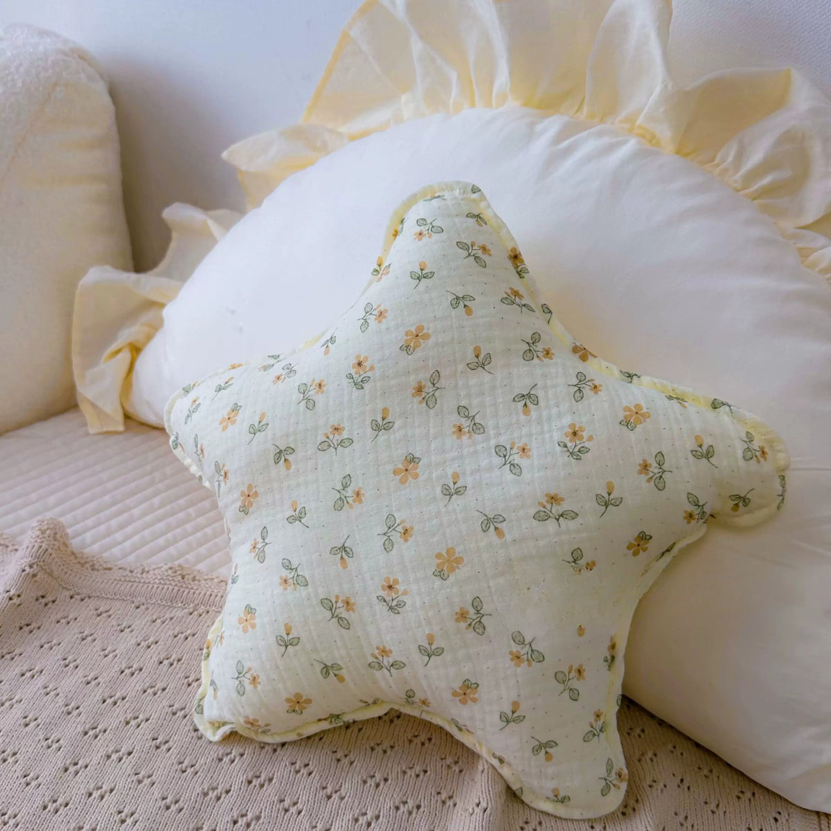 Buttercup yellow ditsy floral star cushion
