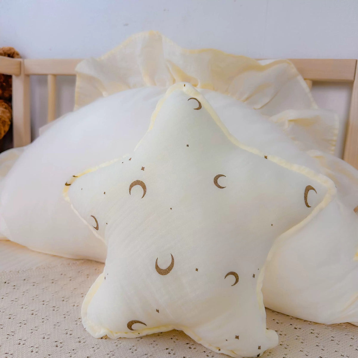 Moon & Stars cream star cushion with tiny gold moons