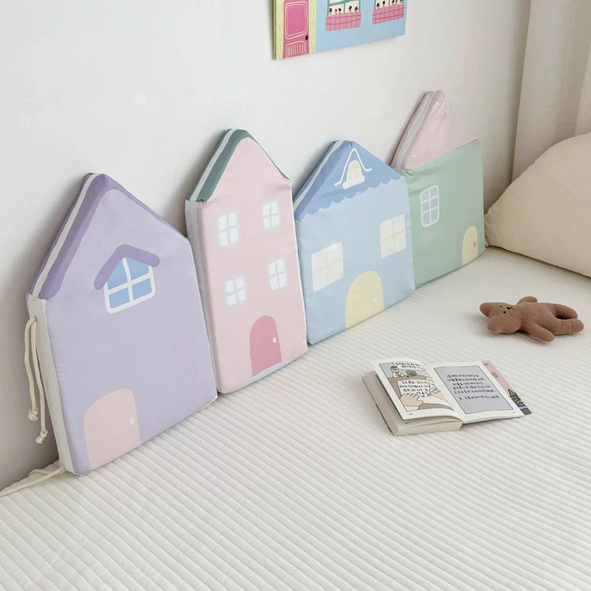 Macaron Row house cushions set in lilac, pink, blue and mint