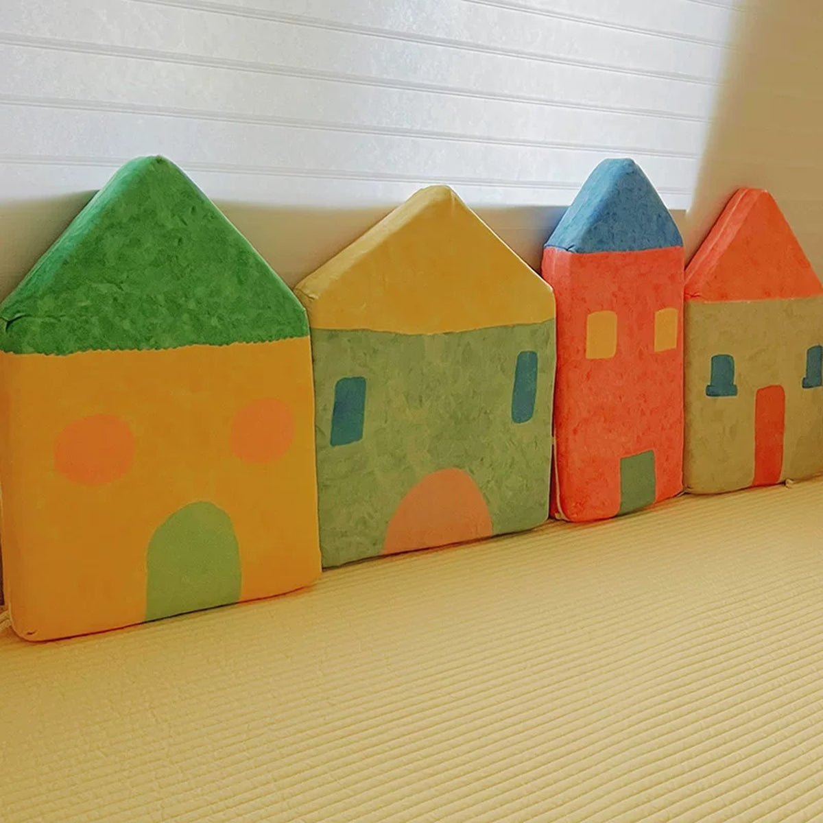 Close-up of the textured Fairytale Village house cushions