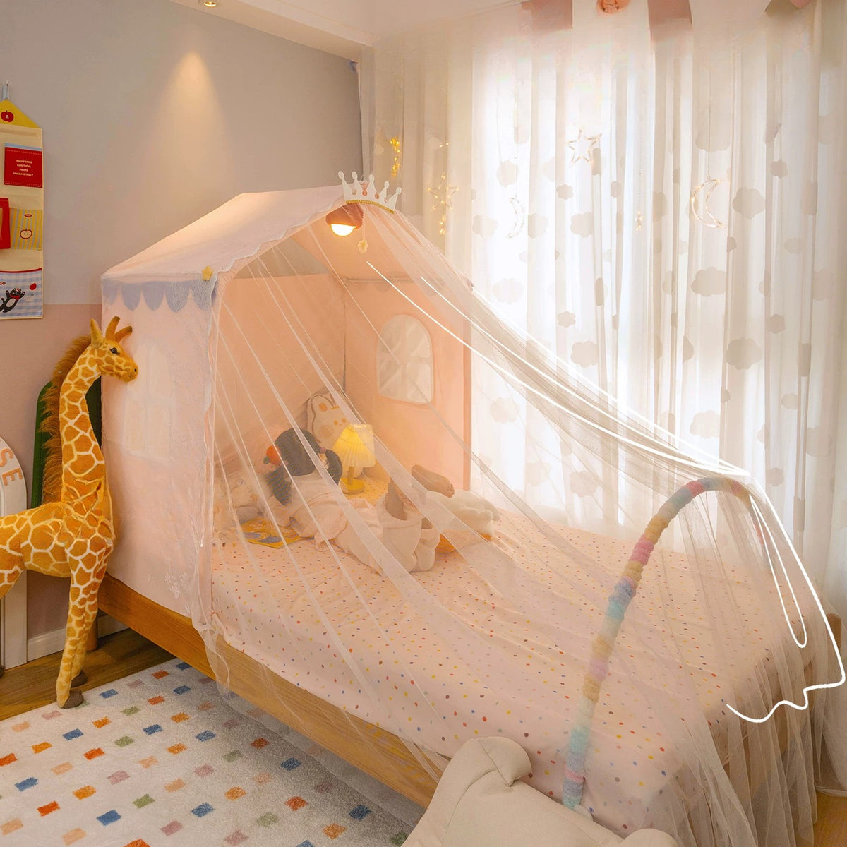 Half-bed house tent with crown, sheer canopy and rainbow arch at the foot of the bed