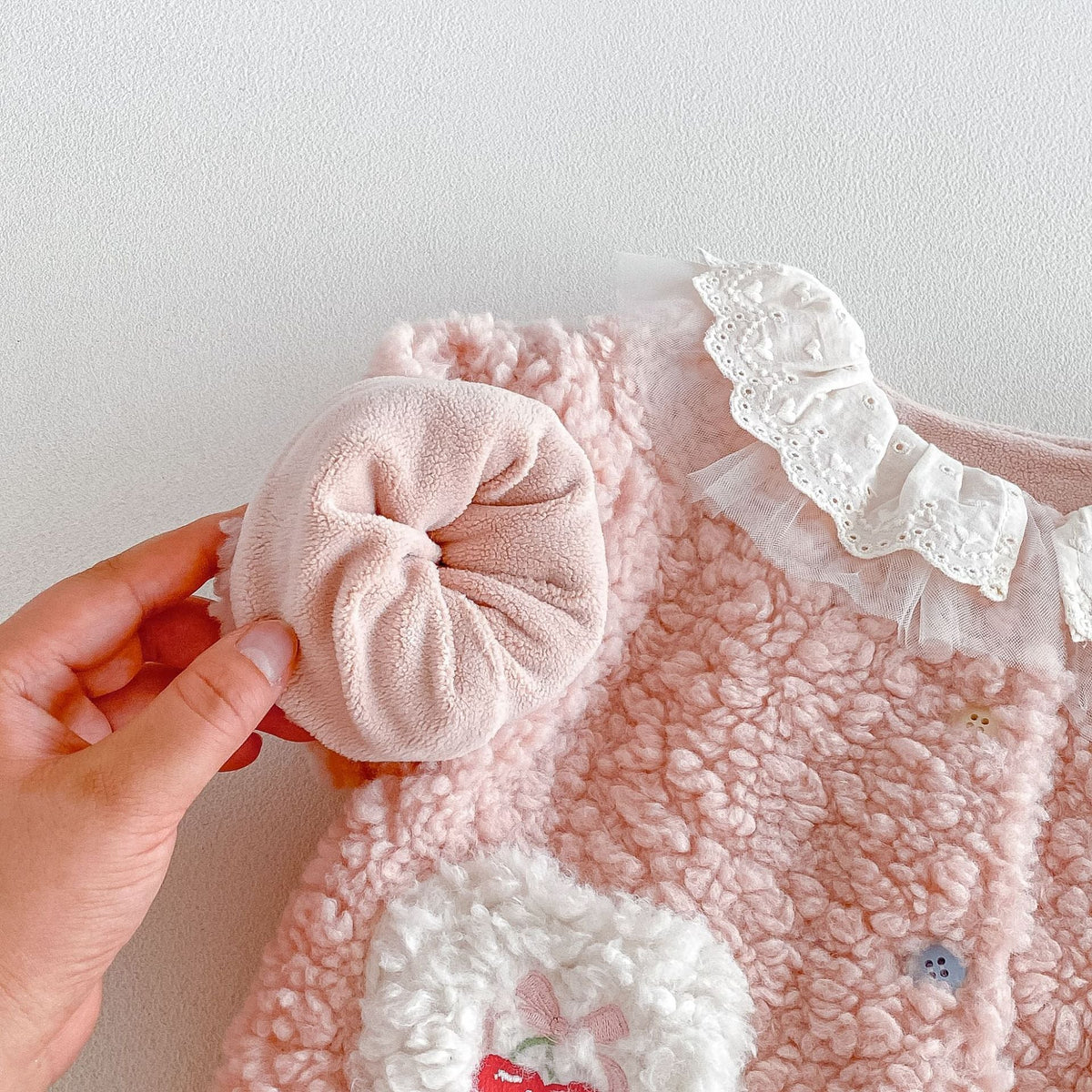 Soft lined sleeve of the pink girls sherpa jacket