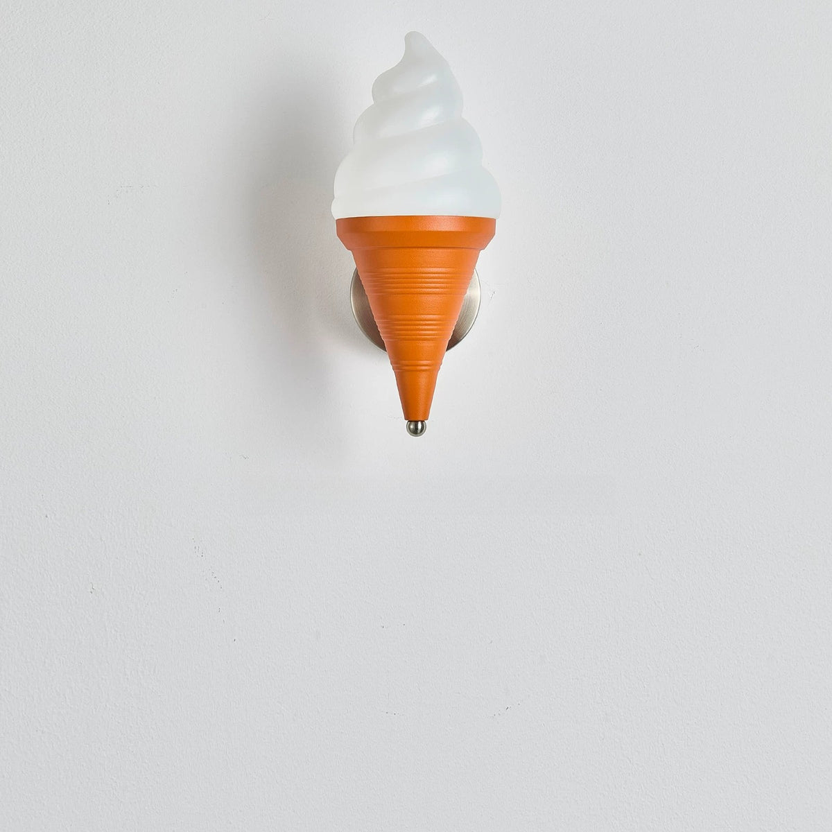 Ice cream wall lamp switched off, showing the white shade