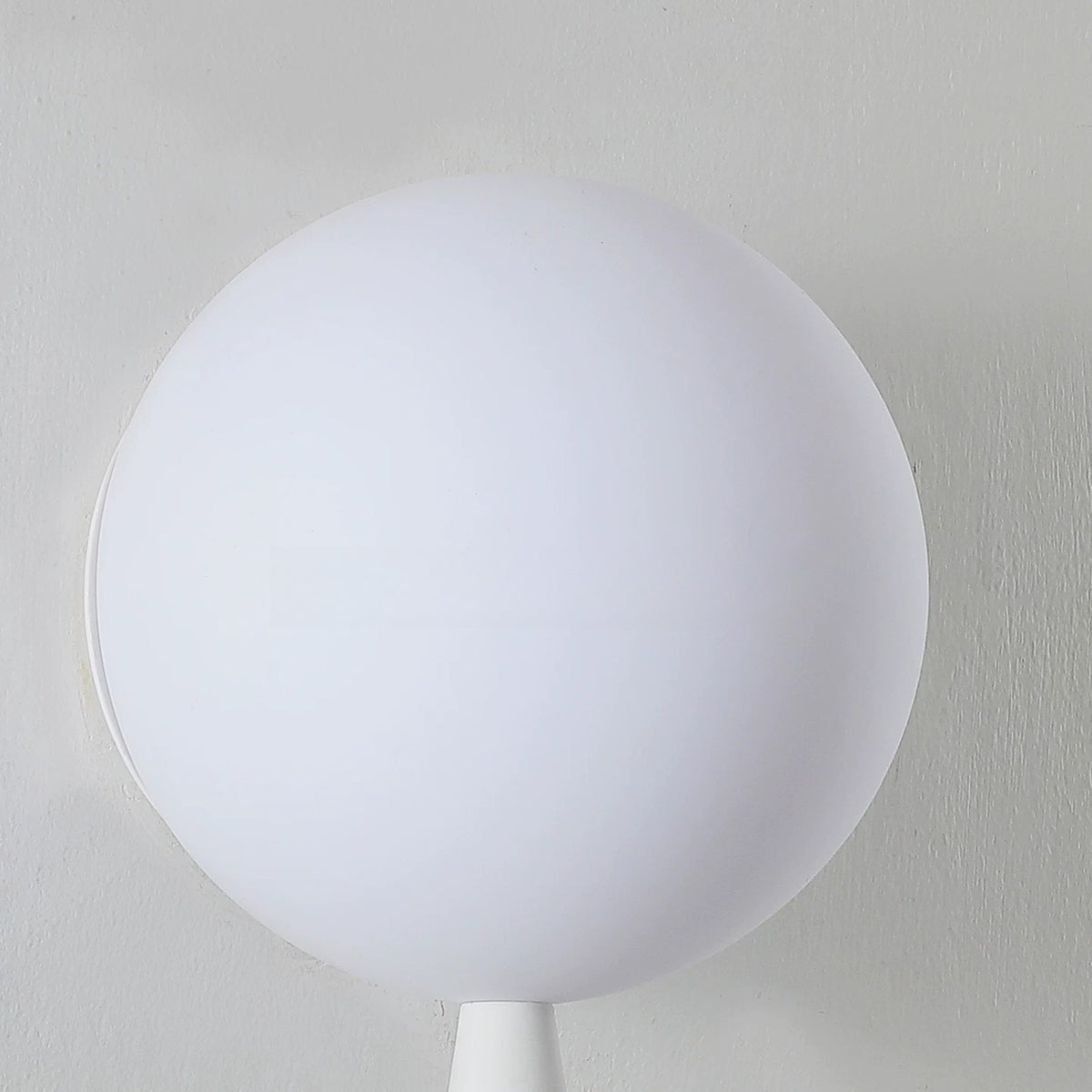 Close-up of the frosted white balloon shade
