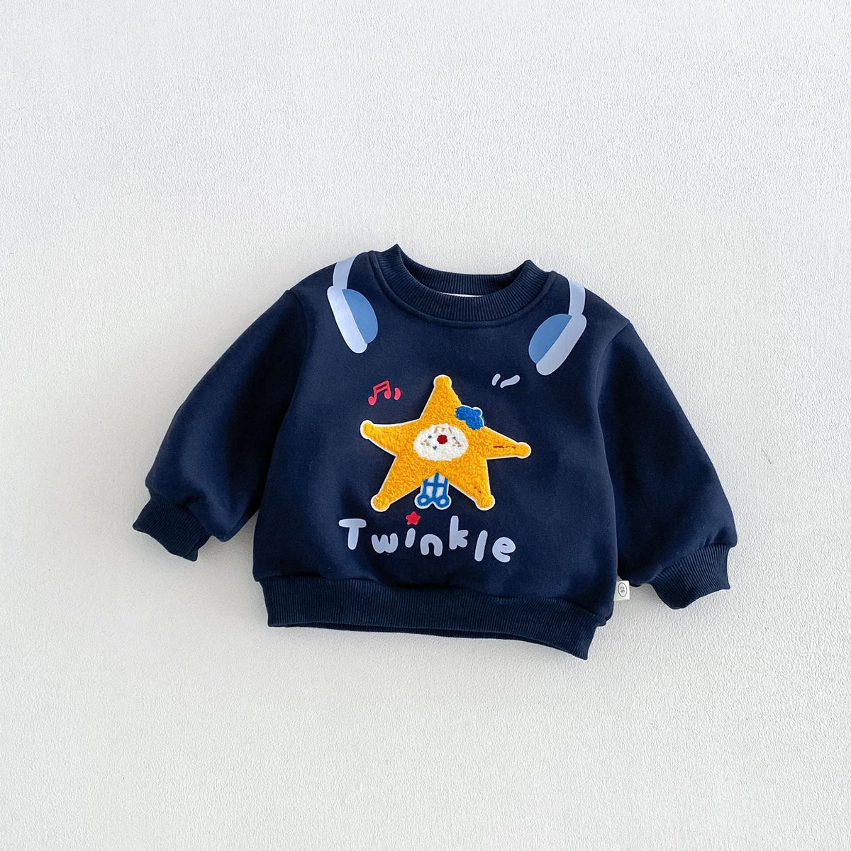 Navy kids sweatshirt with a smiling star patch