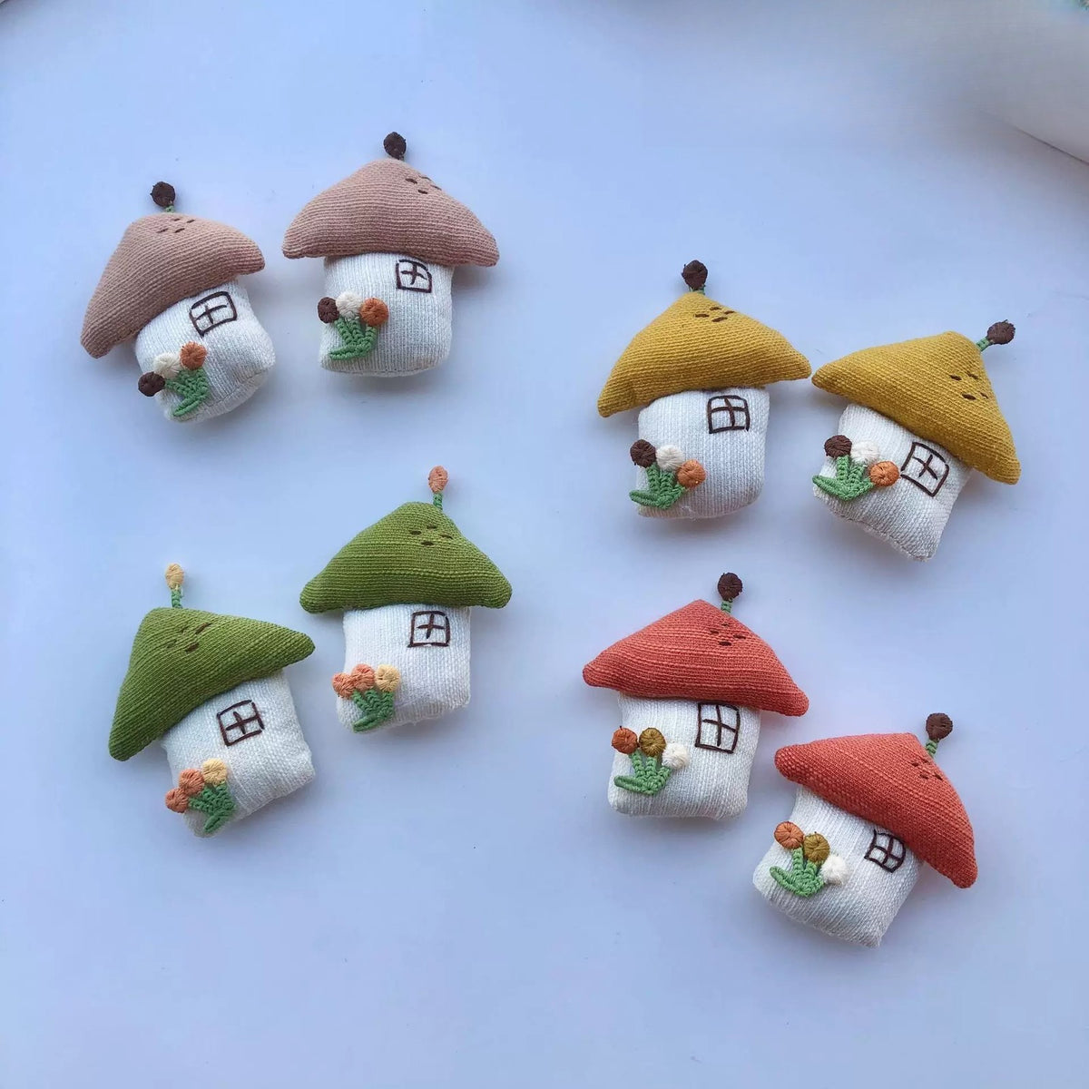 Little Houses set of knitted mushroom-roof house charms with tiny flowers