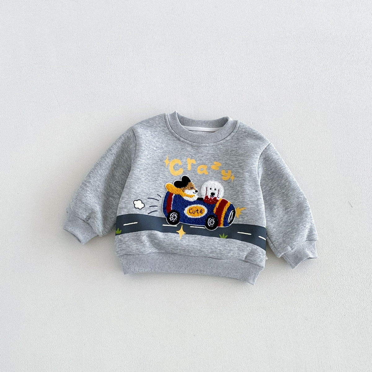 Grey kids sweatshirt with a puppy driving a race car patch