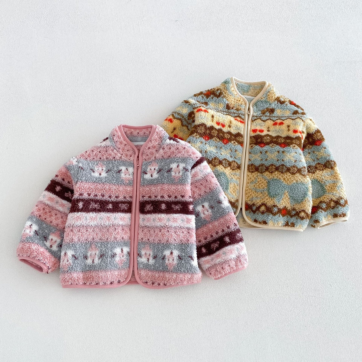 Rose and butter fleece zip jackets side by side