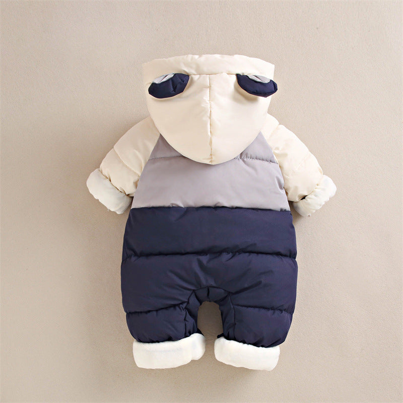 Back view of a color-blocked baby romper in cream, grey, and navy shades. This warm, puffer-style romper features a hood with adorable bear ears, fold-over mittens, and a cozy fleece lining, ensuring complete comfort and protection for babies in cold weather.