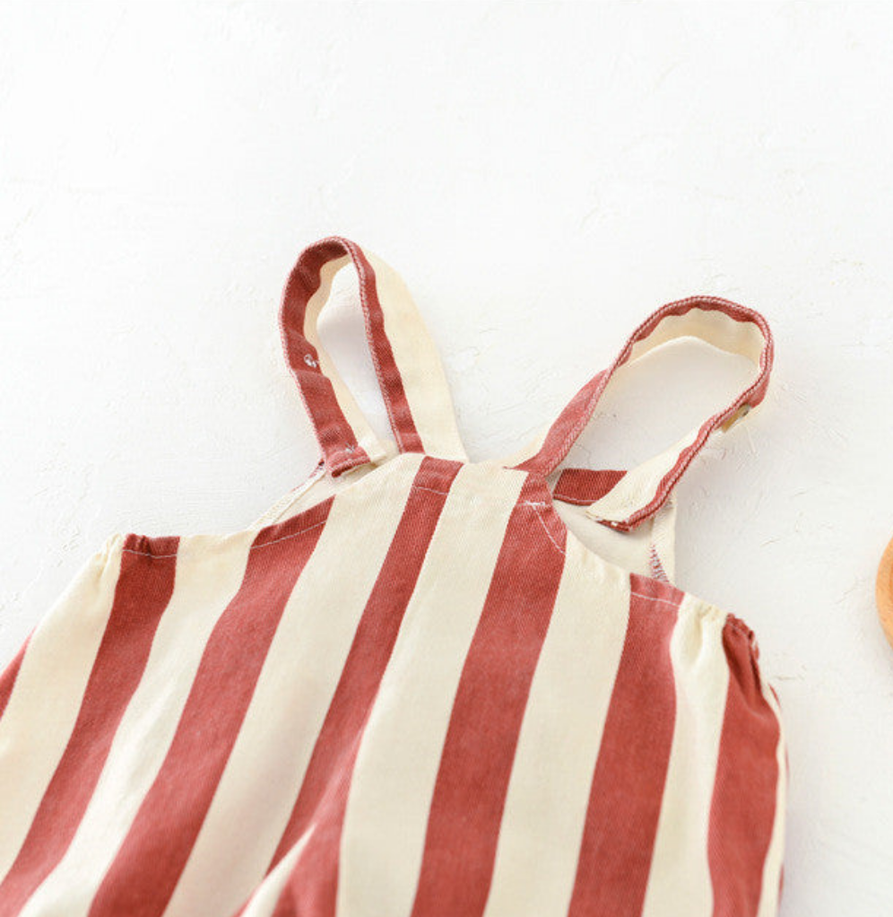 Adjustable striped overall straps detail for baby jumpsuit