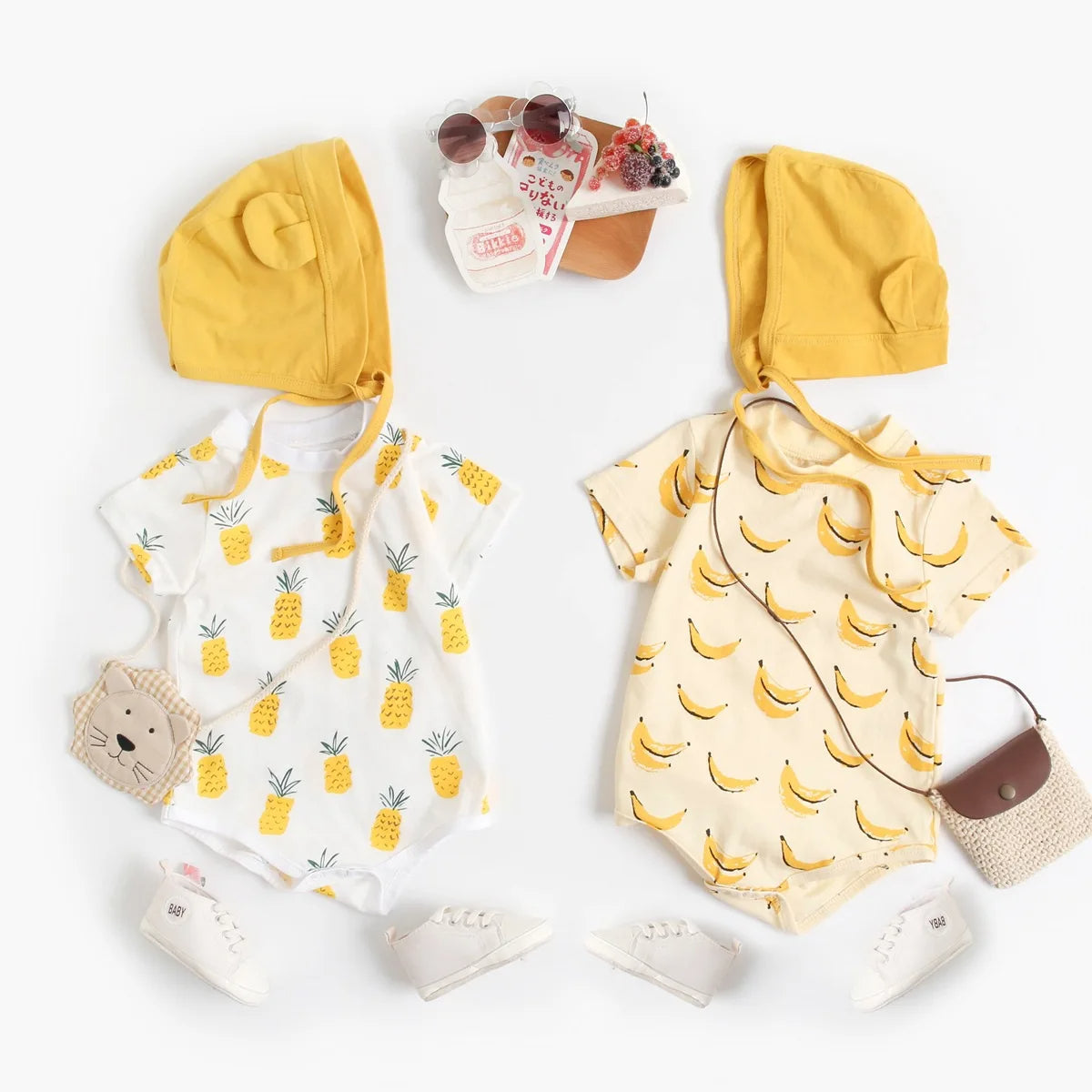 Fruit print baby bodysuit set in pineapple and banana prints with accessories