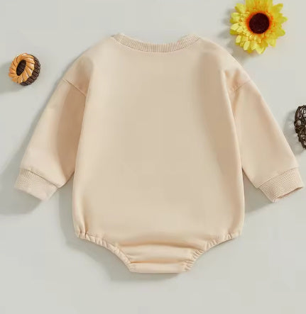 Tan long sleeve baby bubble romper back view, ribbed sweatshirt style
