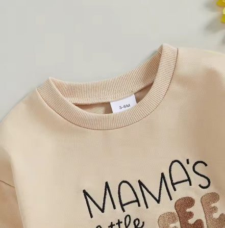 Mama's Little Coffee Bean graphic sweatshirt romper neckline close-up