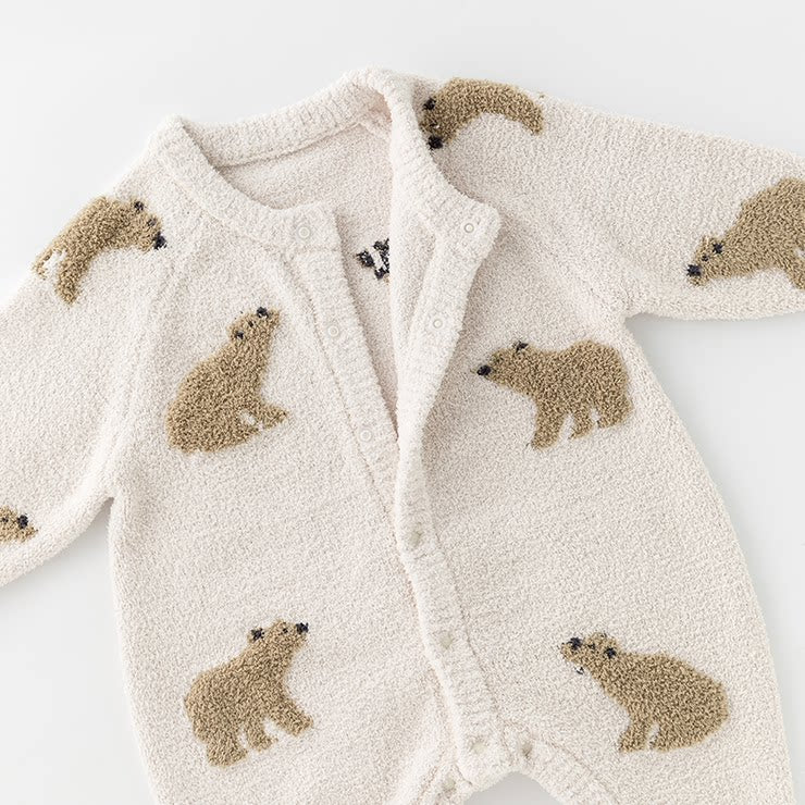 Close-up of the snap front and teddy-textured bears on the oat romper