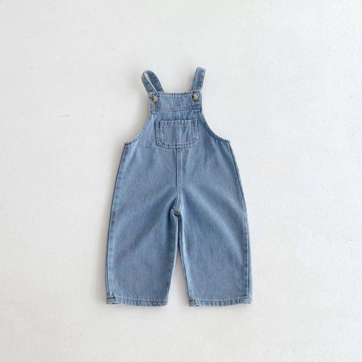 Light wash denim kids overalls, flat lay
