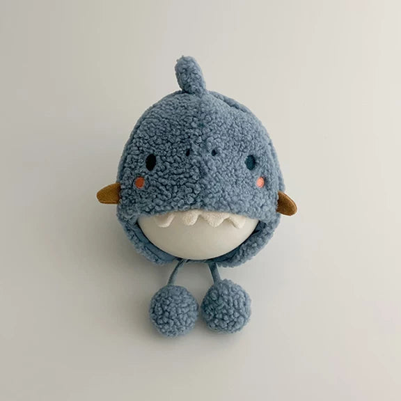 Denim blue dinosaur baby winter hat with pom-pom ties