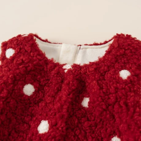 Close-up of the round neckline on the red teddy fleece dress