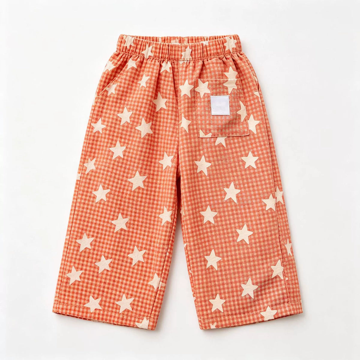 Coral star gingham wide-leg kids pants, flat lay