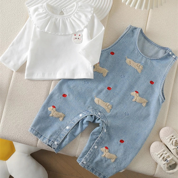 Dachshund denim overalls and white ruffle-collar top laid side by side