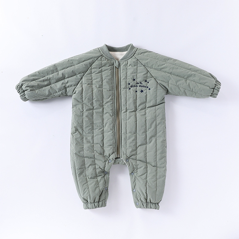 Dino sage green quilted baby romper with zip front, flat lay