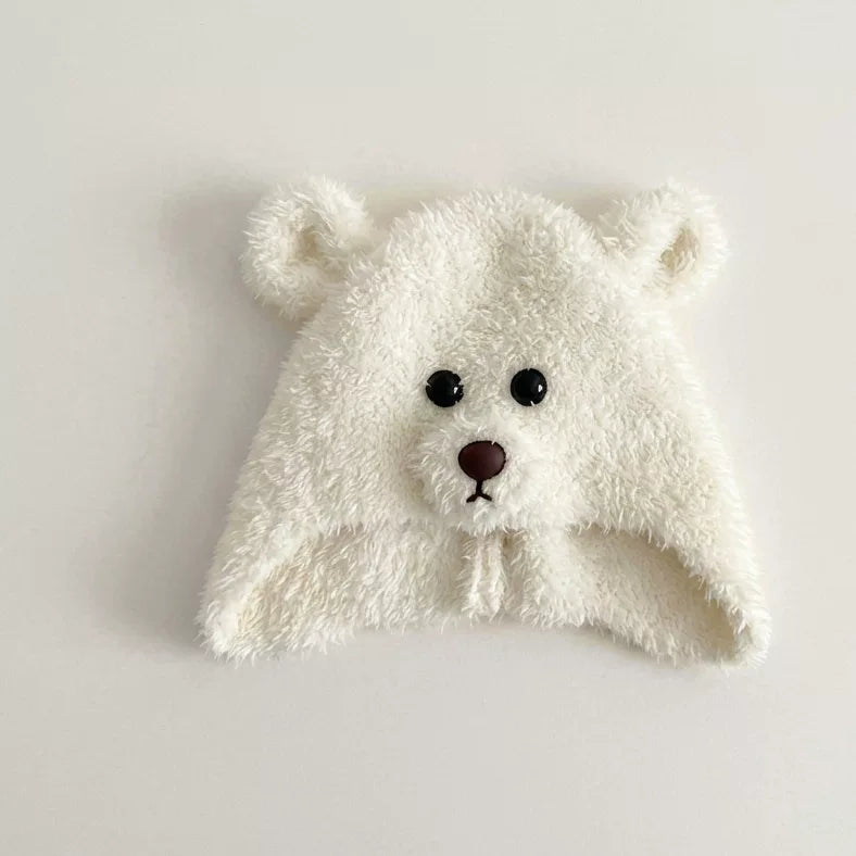 Cream bear hat with ear flaps, front view