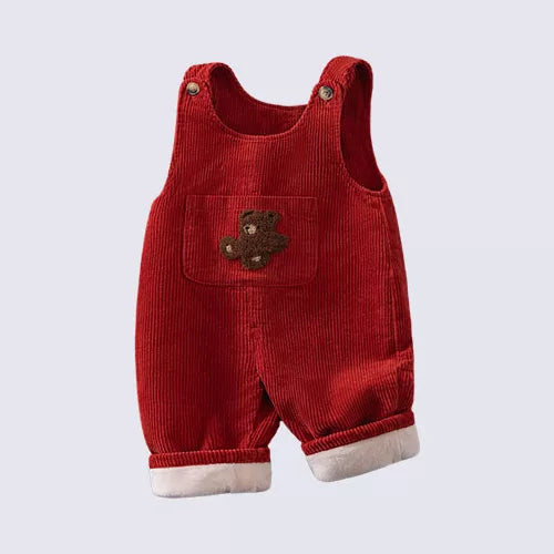 Cherry red fleece-lined corduroy dungarees for babies with bear appliqué