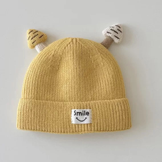 Mustard yellow mushroom knit beanie with folded cuff