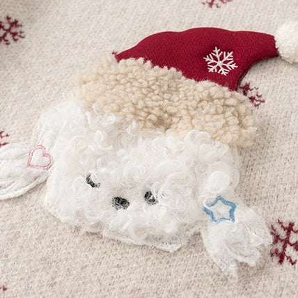 Close-up of the fluffy 3D puppy appliqué with red pom-pom hat