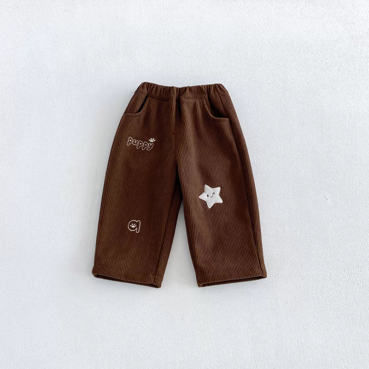 Chestnut brown fleece-lined kids pants with white star embroidery