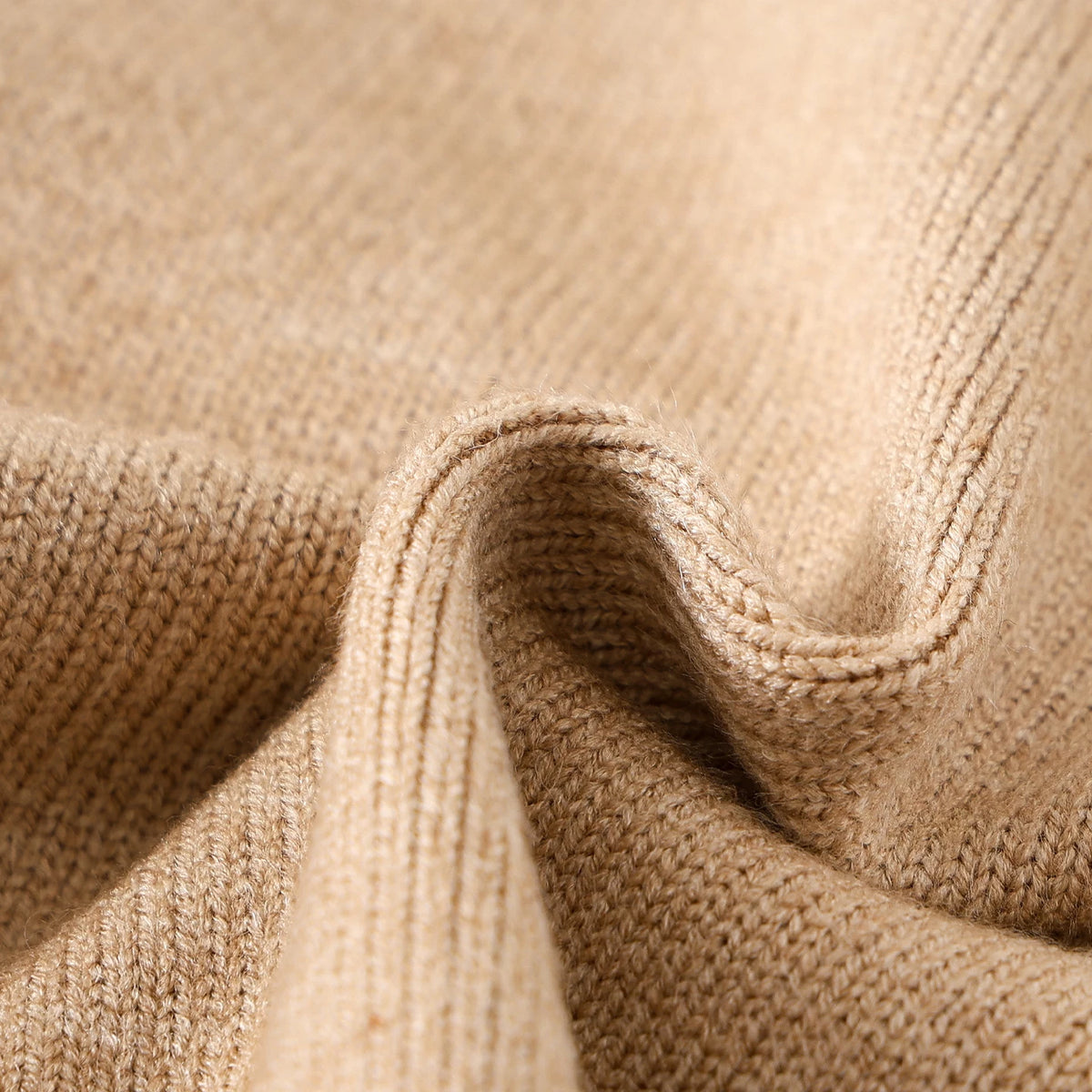 Close-up of soft camel knit fabric