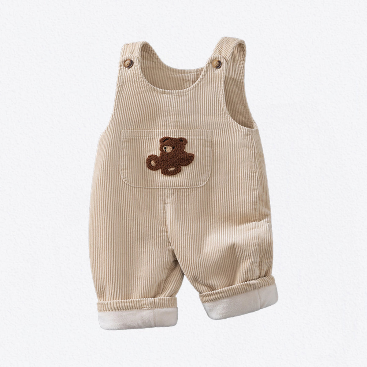 Oat corduroy baby overalls with brown teddy bear patch pocket, product shot