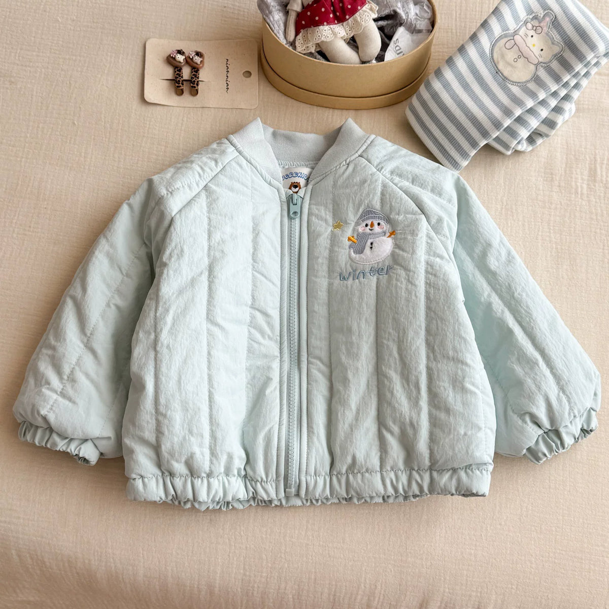 Front view of mint padded winter jacket for girls