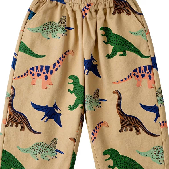 Close-up of colourful dinosaur print on khaki kids pants