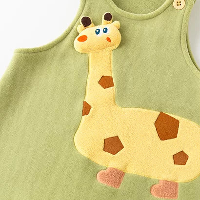 Giraffe appliqué on the front of the green fleece onesie