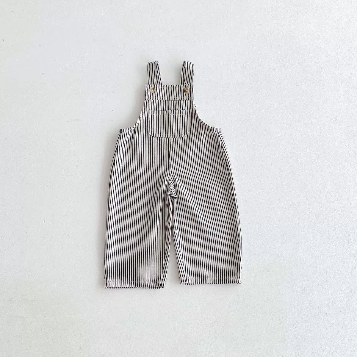 Grey and white striped kids overalls, flat lay