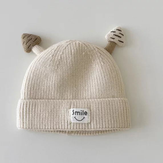 Cream knit baby beanie with two little mushroom ears