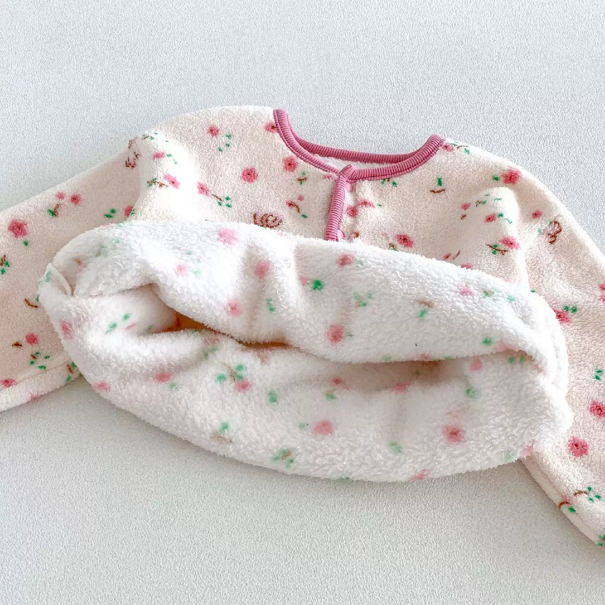 Soft plush inside of a girls fleece pajama top