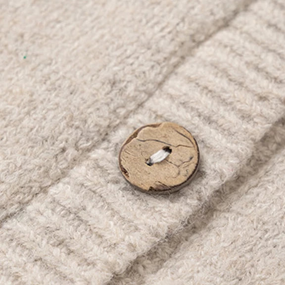 Button and ribbed placket detail on kids cardigan
