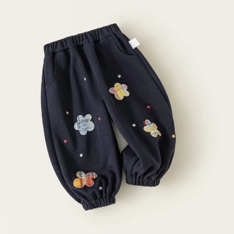 Navy flower-patch sweatpants for girls with elastic cuffs