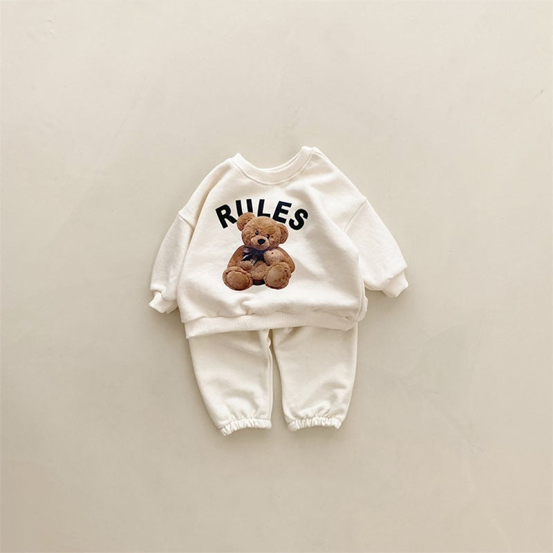 Cream teddy bear print sweatshirt and jogger set, baby loungewear flat lay