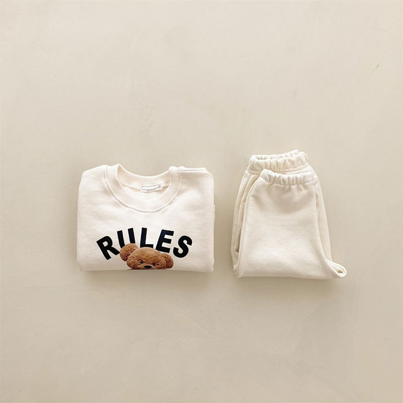 Folded cream teddy bear sweatshirt and matching jogger pants set